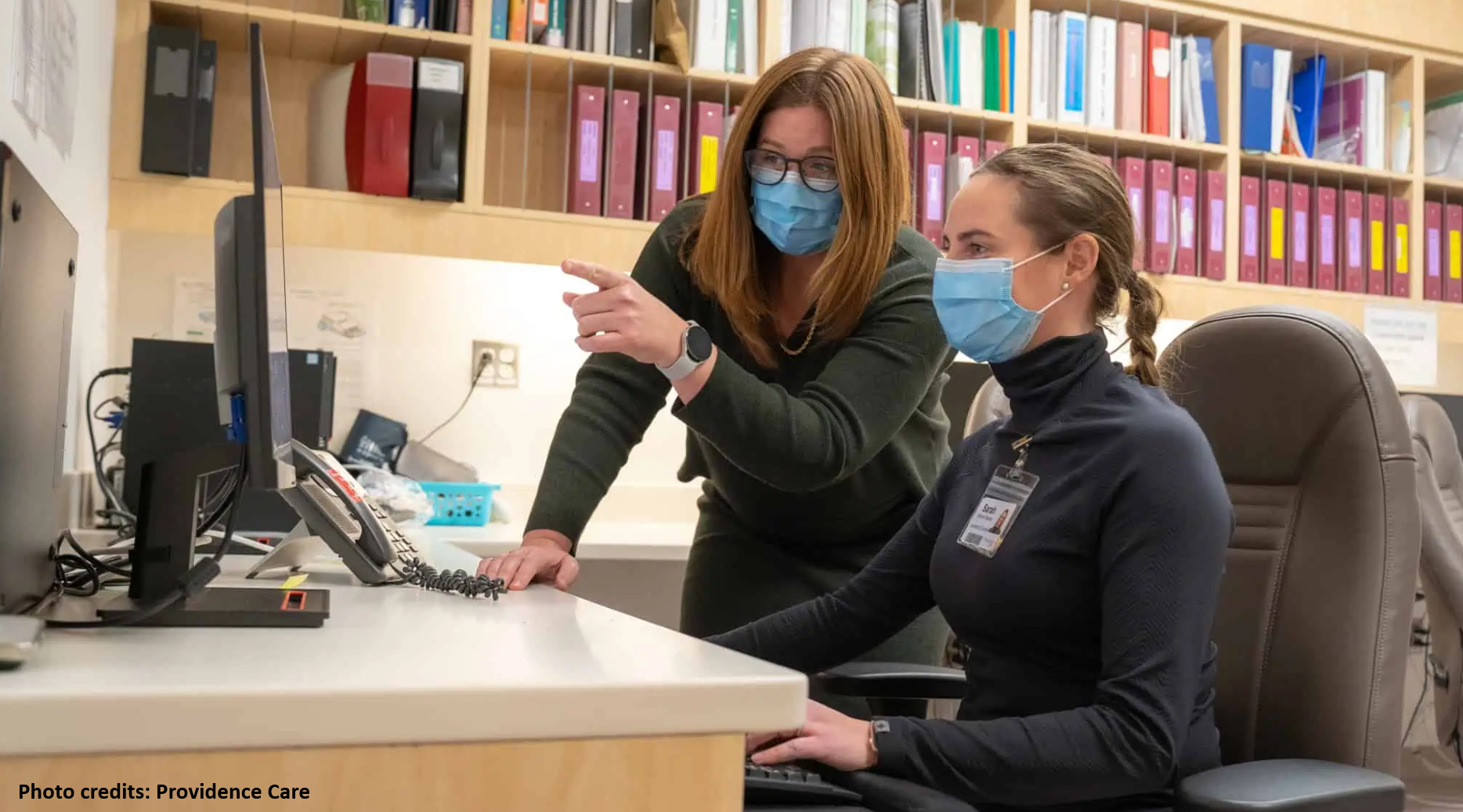 Dr. Goldie and Dr. Moore-Vasram looking at a monitor
