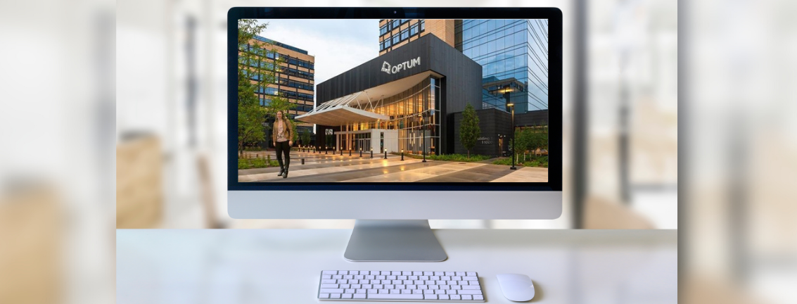 Computer monitor displaying a photoshopped image of Katelyn Balchin in front of her internship placement location, Optum Healthcare.