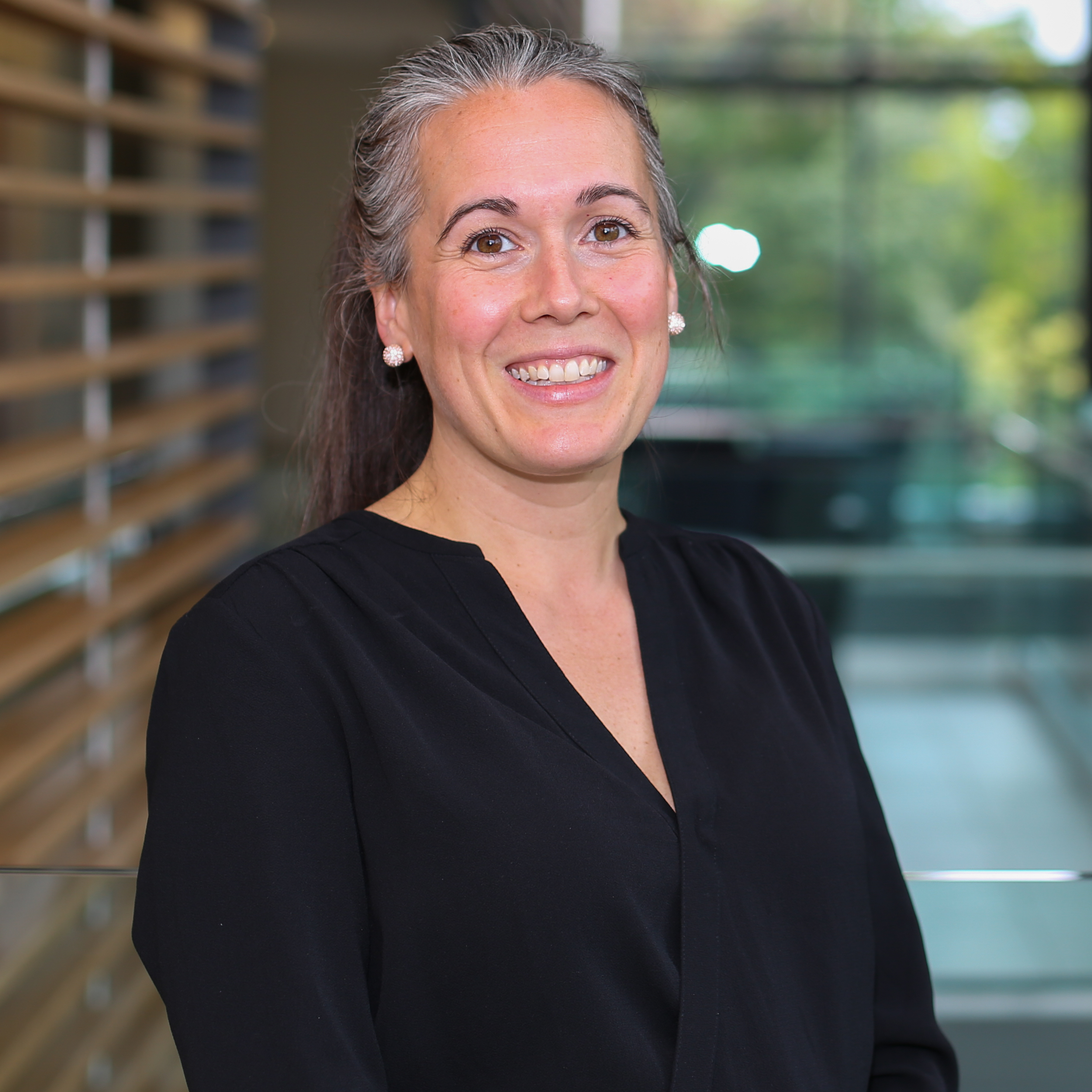 headshot of Dr. Alyson Mahar